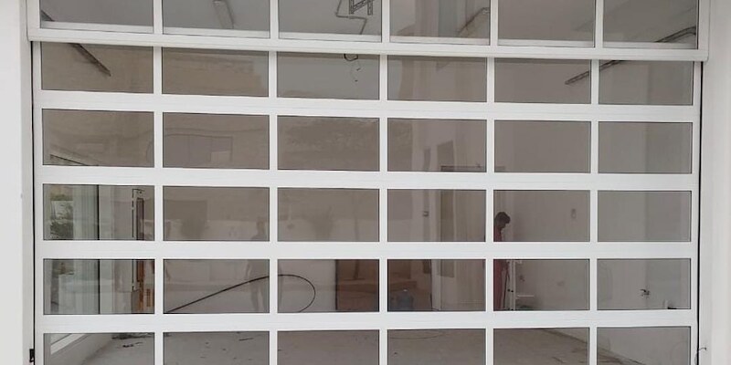 Glazed full-vision automatic door installed at a commercial entrance