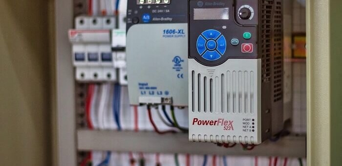 Electrical distribution panel with circuit breakers and a variable speed drive
