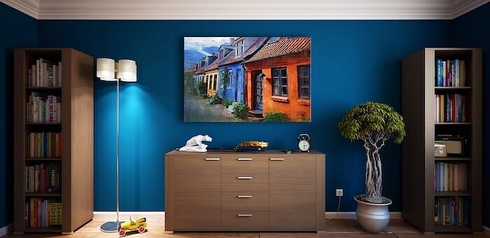 Interior room finished with a deep blue painted feature wall